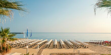 Stranden vid hotell Aquila Porto Rethymno på Kreta, Grekland.