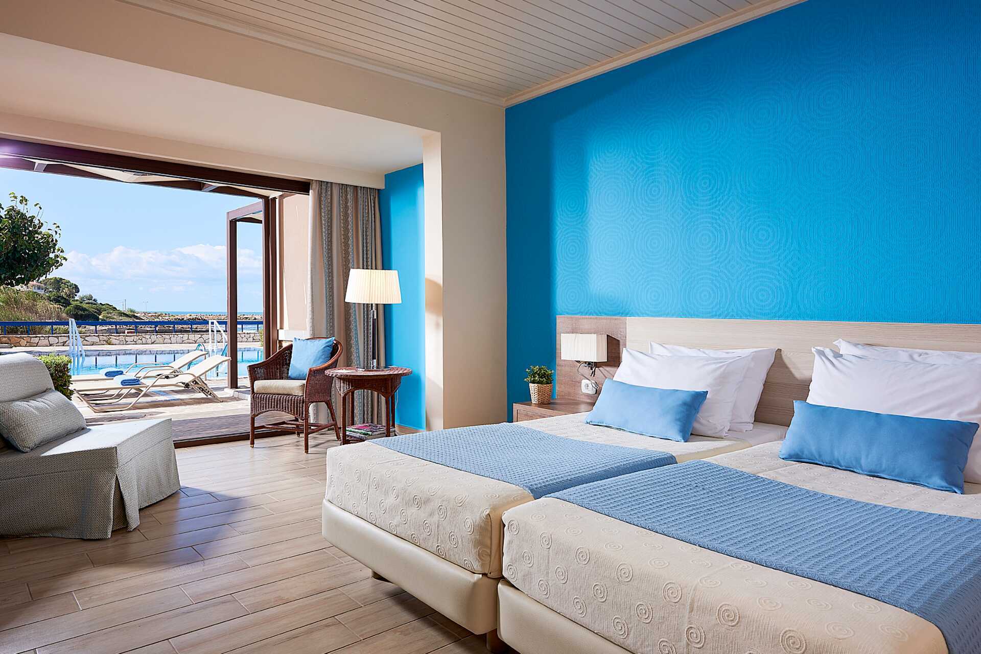 Bungalow med delad pool på hotell Aldemar Olympian Village i Skafidia, Grekland.