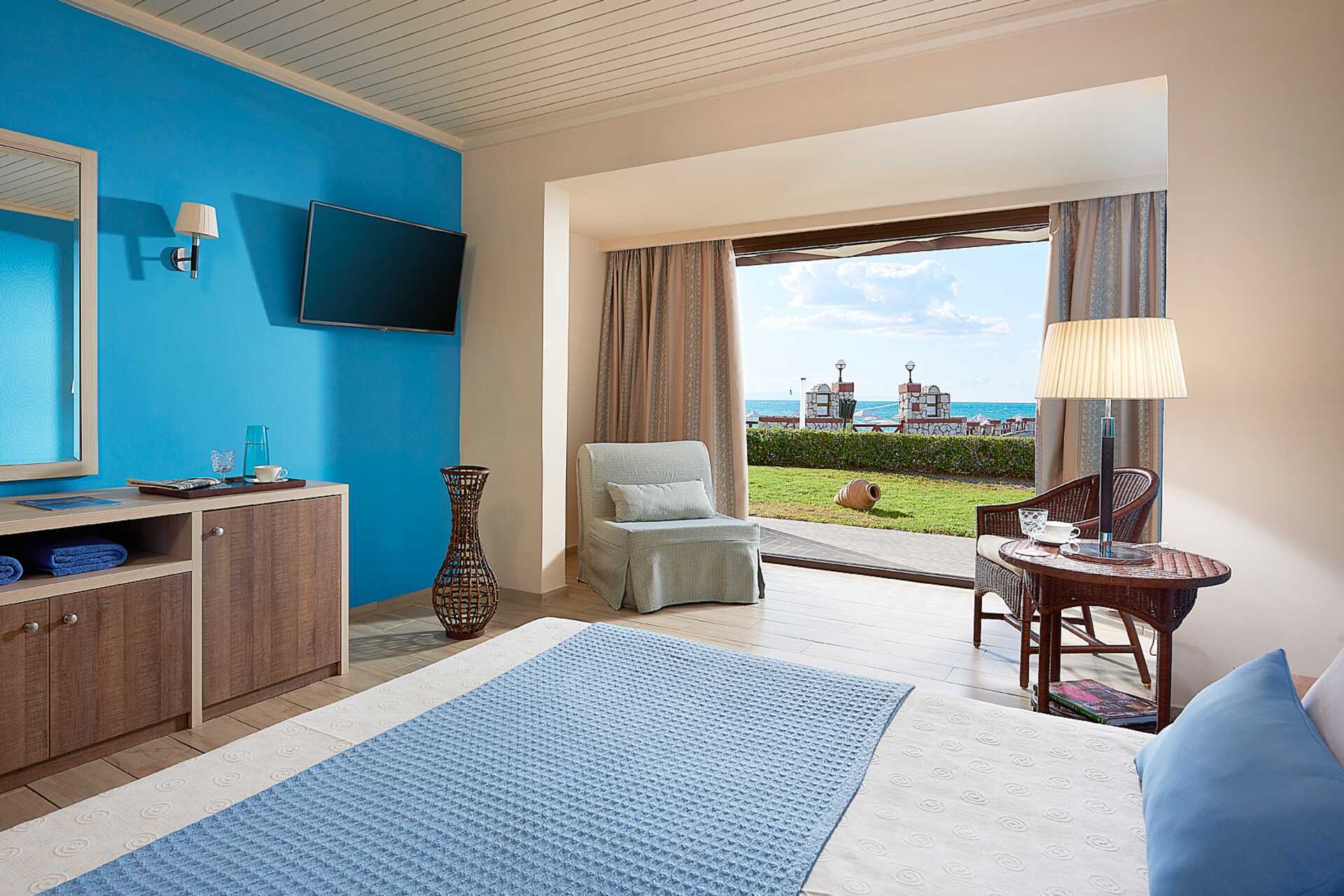 Bungalow med delad pool på hotell Aldemar Olympian Village i Skafidia, Grekland.