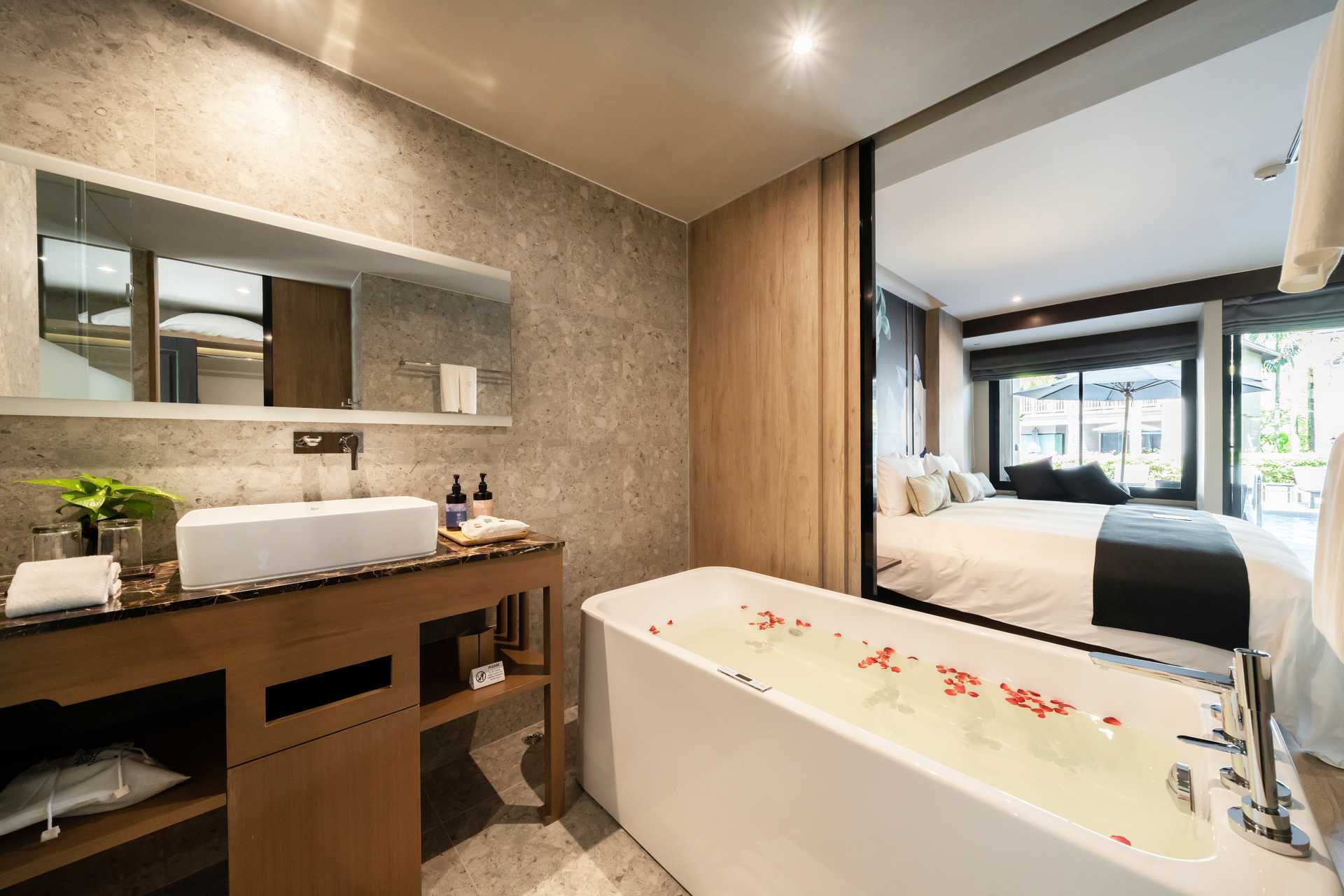 Dubbelrum med delad pool på La Flora Khao Lak i Khao Lak, Thailand.