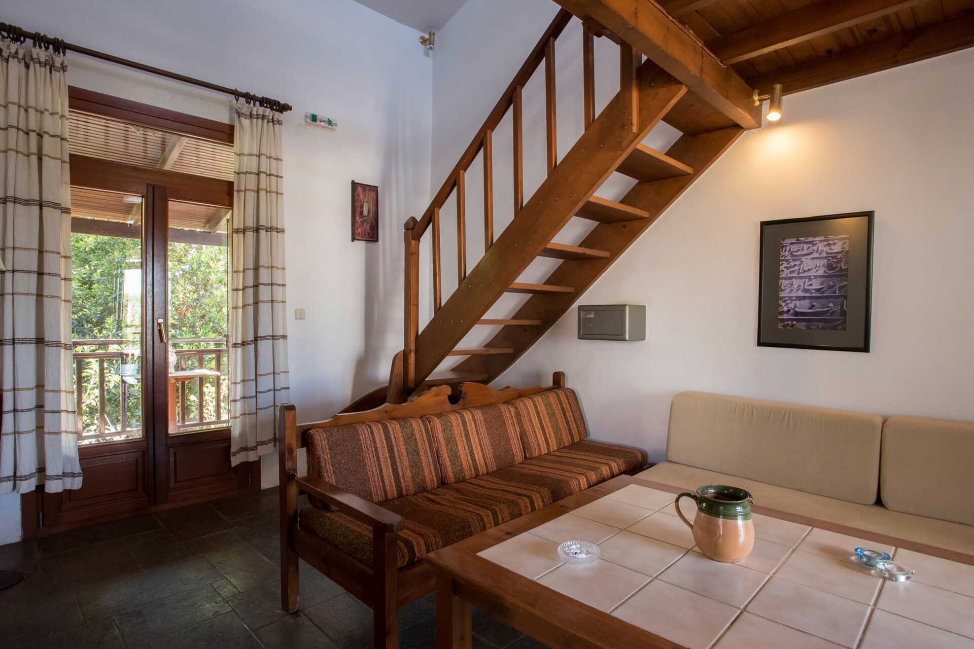 Enrumslägenhet i etage på hotell Proimos Maisonnettes i Platanias, Kreta.
