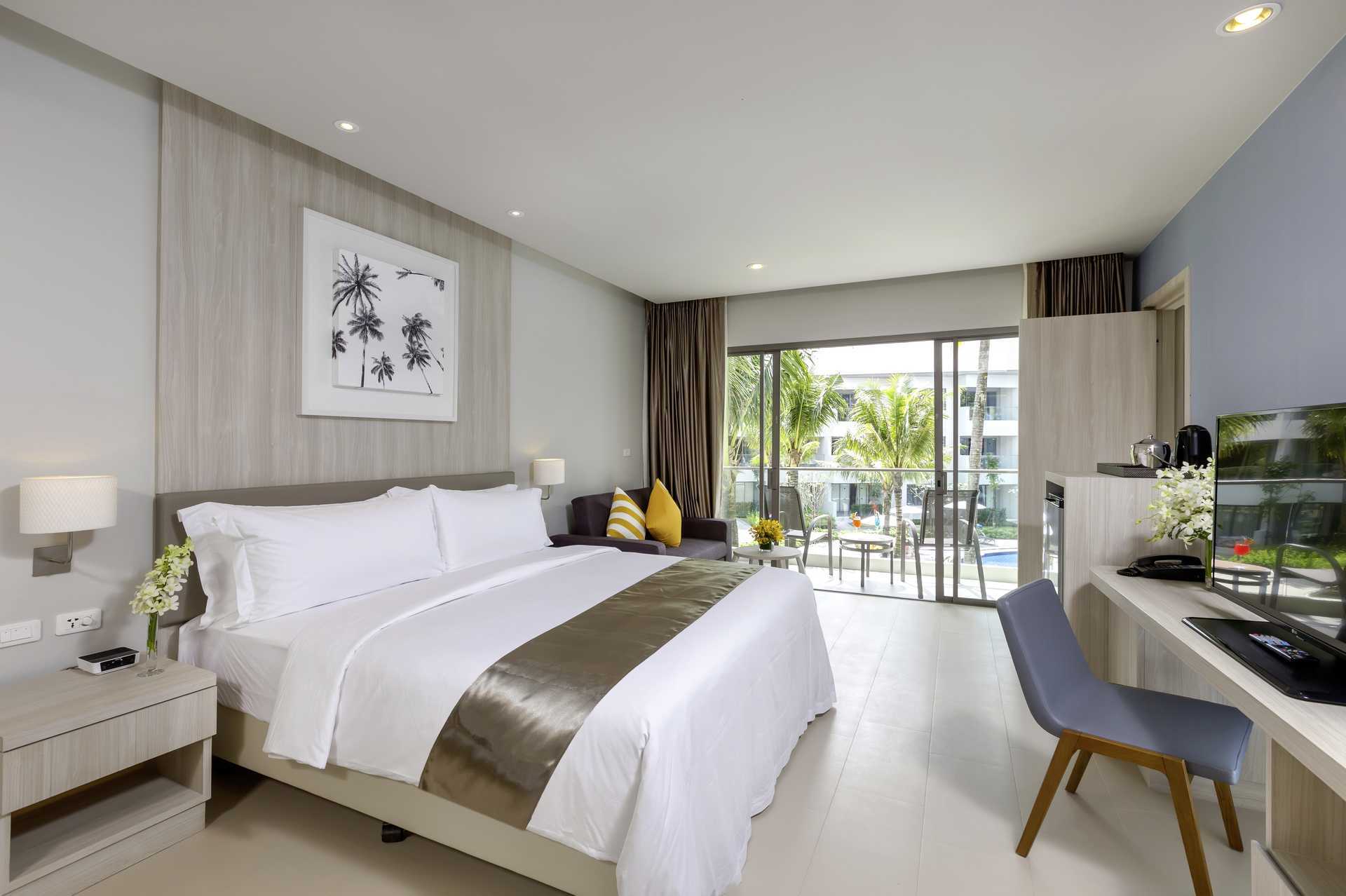 Familjerum med fyra ordinarie bäddar på X10 Khao Lak, Thailand.