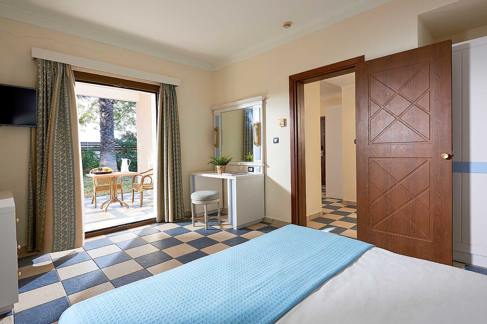 Familjerum på hotell Aldemar Olympian Village i Skafidia, Grekland.