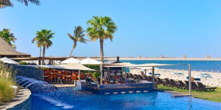 Poolområde på Hotell JA Beach i Dubai.