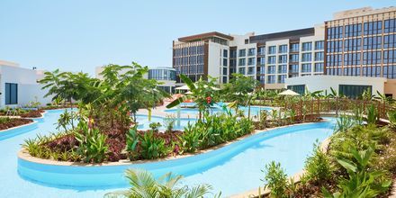 Poolområde på hotell Millennium Salalah Resort i Oman.