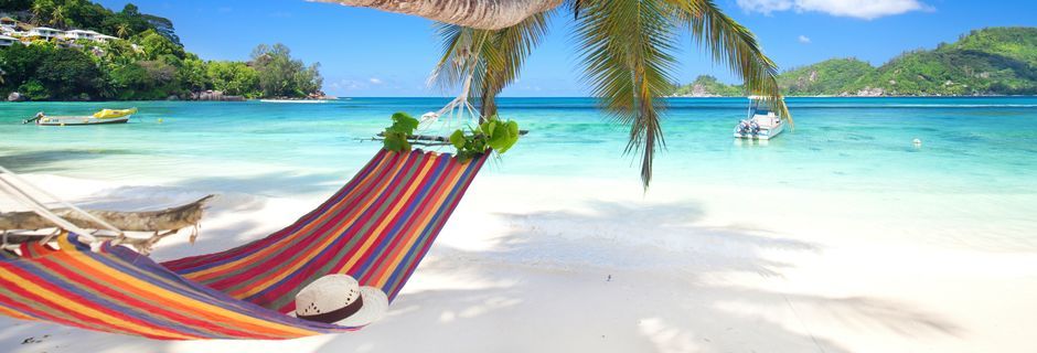 Avkoppling, sol och härliga bad står på schemat på semester på Seychellerna.
