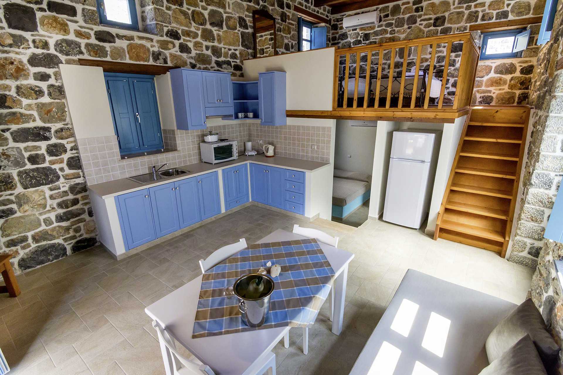 Tvårumslägenhet i etage på Pserimos Villas, Grekland.